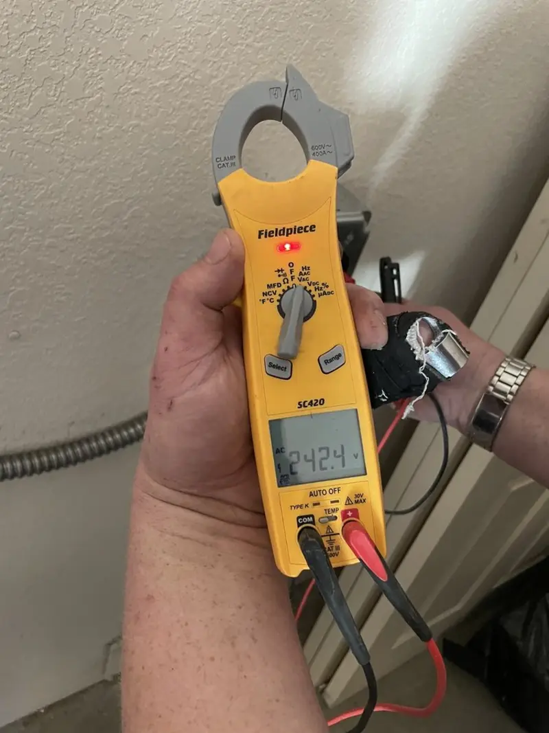 Voltage testing with clamp meter during Aluminum Wiring Replacement in Courtland